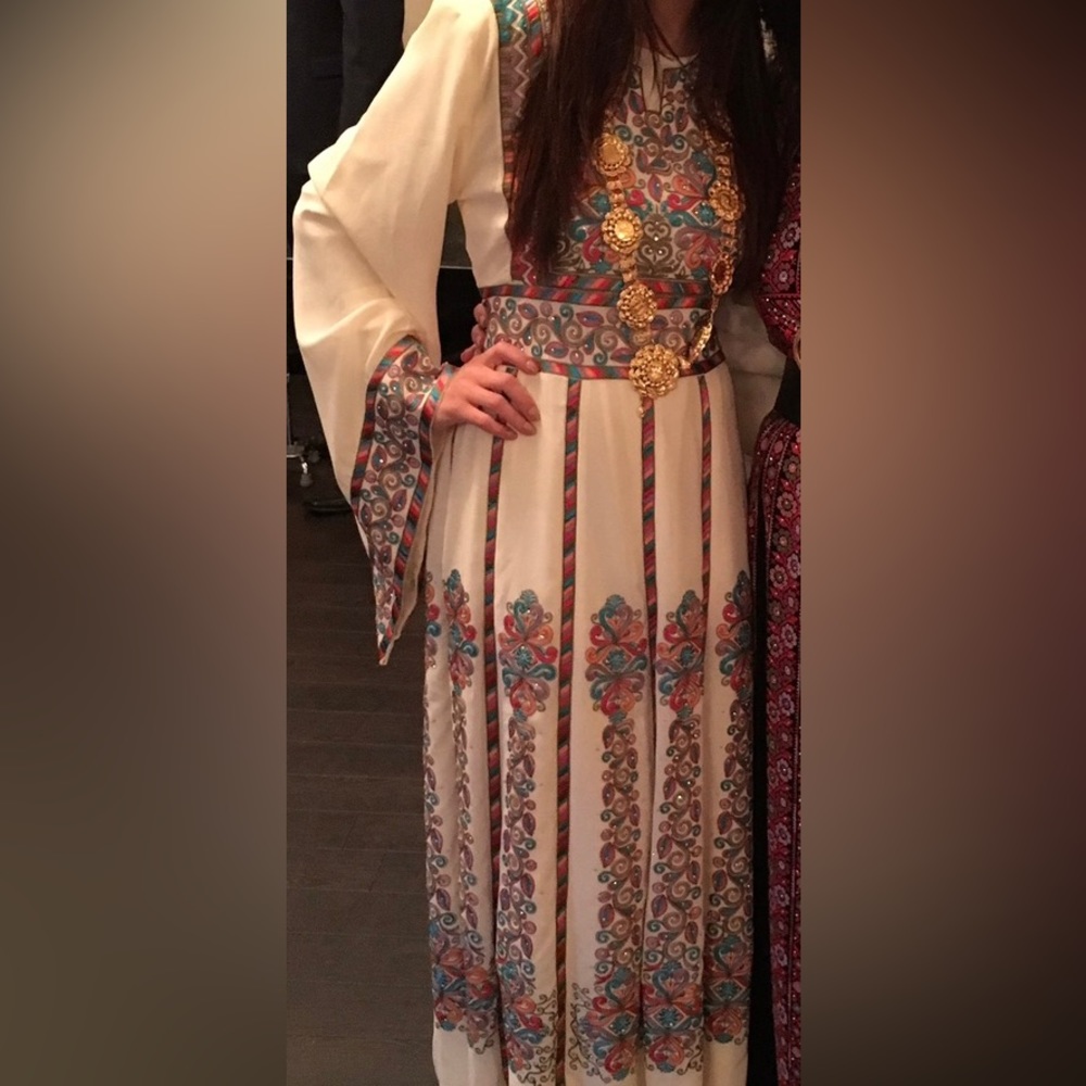 Ivory abaya with attached tie belt. Worn once